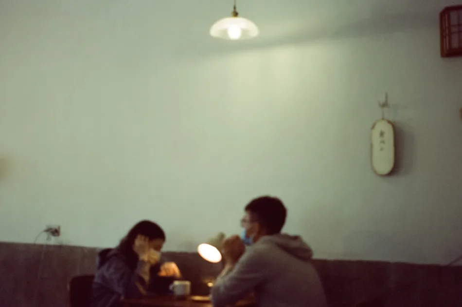 a man and a woman sitting at a table